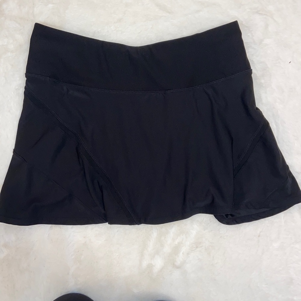 Black tennis skirt with mesh design